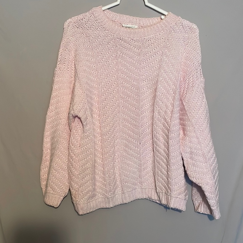 Light pink women’s knit sweater